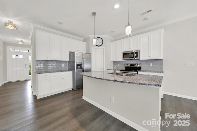769 River Park Rd, Belmont, NC 28012 - kitchen featuring stainless steel appliances, a sink, backsplash, white cabinetry, and ornamental molding
