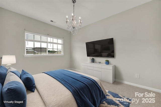 769 River Park Rd, Belmont, NC 28012 - bedroom featuring a chandelier, baseboards, and carpet
