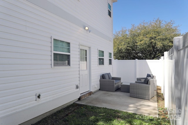 view of patio / terrace with outdoor lounge area and a fenced backyard