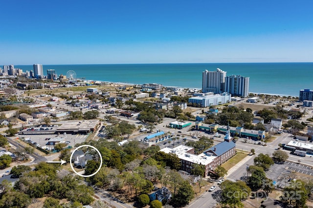 aerial view with a water view and a city view