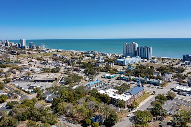 bird's eye view featuring a view of city and a water view