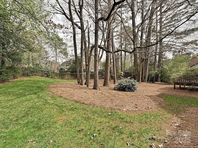 view of yard featuring fence