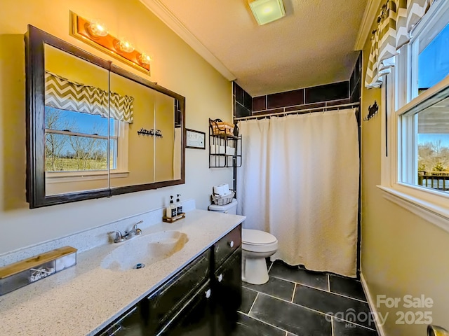 full bath with vanity, curtained shower, toilet, a textured ceiling, and tile patterned floors