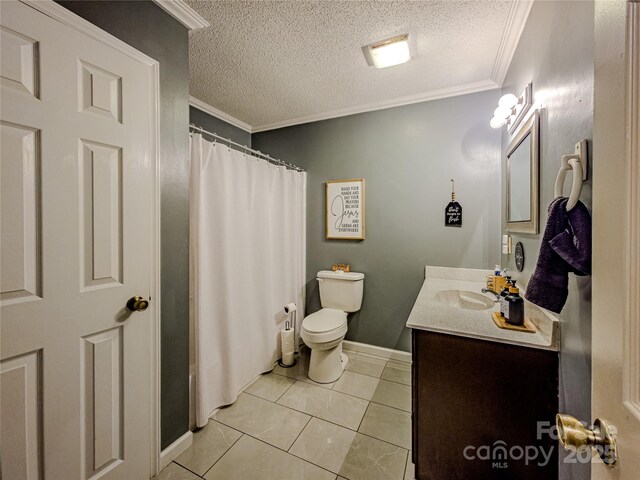 full bathroom with crown molding, toilet, a textured ceiling, and vanity