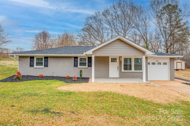 ranch-style house featuring a front yard, driveway, a porch, a garage, and brick siding