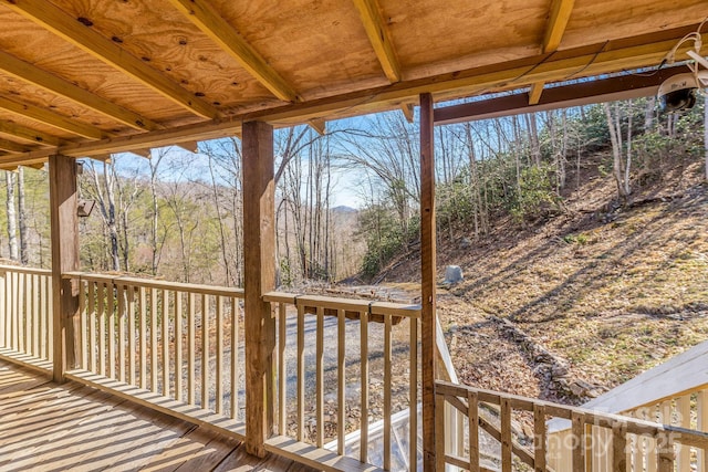 deck featuring a view of trees