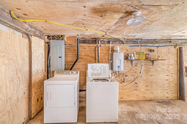 washroom with laundry area, electric panel, independent washer and dryer, and water heater