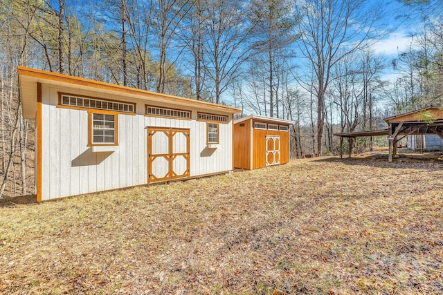 view of shed featuring a detached carport