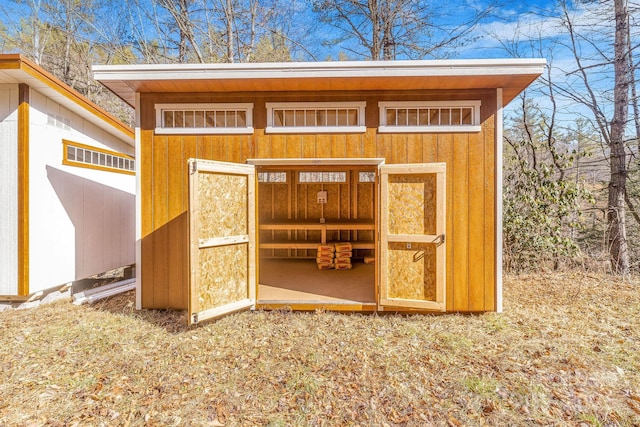 view of outbuilding with an outbuilding