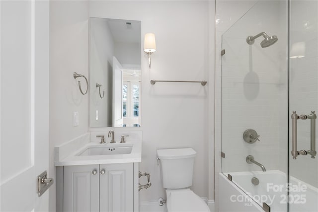 full bath with toilet, bathtub / shower combination, and vanity