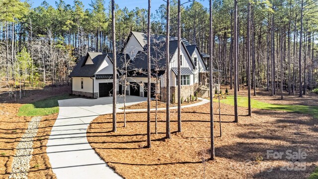 4354 Persimmon Rd, Lancaster, SC 29720 - view of front facade featuring a shingled roof, a garage, and concrete driveway