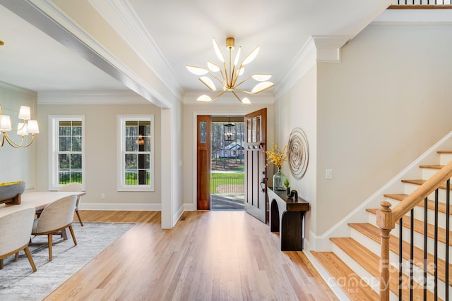 4354 Persimmon Rd, Lancaster, SC 29720 - foyer entrance with wood finished floors, a notable chandelier, and stairs