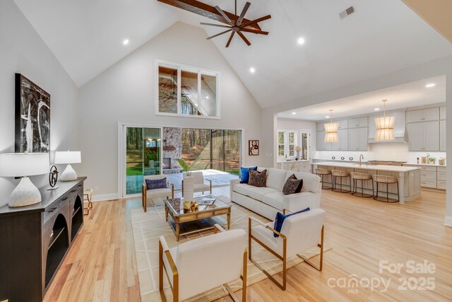 4354 Persimmon Rd, Lancaster, SC 29720 - living area featuring visible vents, recessed lighting, high vaulted ceiling, and light wood-style floors