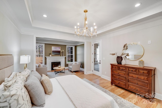 4354 Persimmon Rd, Lancaster, SC 29720 - bedroom with a chandelier, light wood-style floors, multiple windows, and recessed lighting