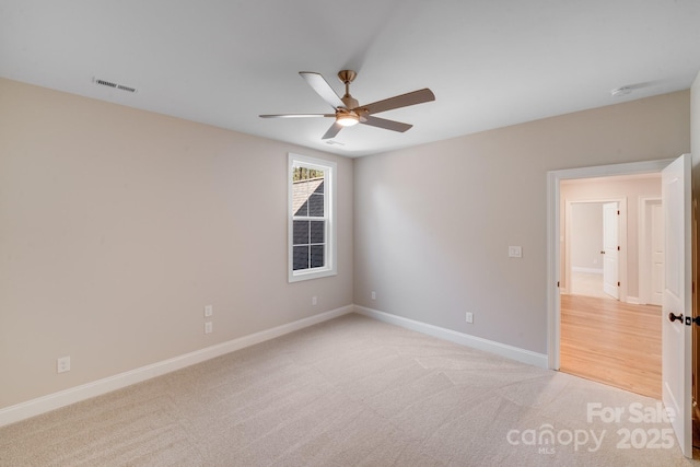 4354 Persimmon Rd, Lancaster, SC 29720 - empty room with light colored carpet, baseboards, a ceiling fan, and visible vents