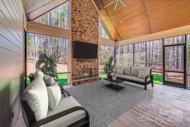 4354 Persimmon Rd, Lancaster, SC 29720 - sunroom featuring plenty of natural light, an outdoor living space with a fireplace, and a ceiling fan