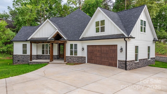 3732 Whitney Dr NE, Hickory, NC 28601 - modern farmhouse with board and batten siding, covered porch, stone siding, and concrete driveway