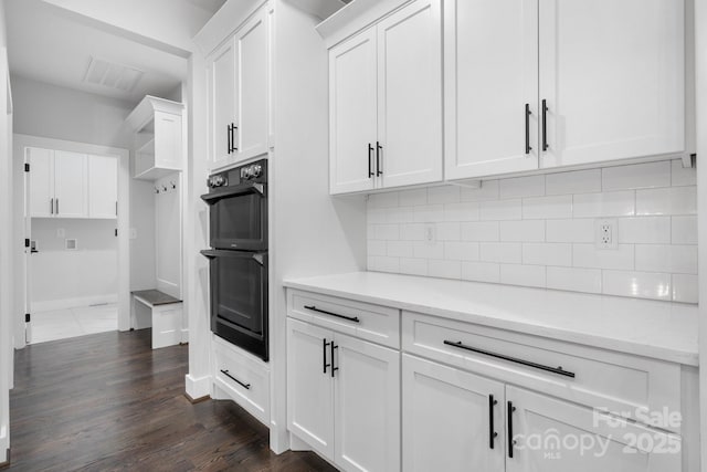 3732 Whitney Dr NE, Hickory, NC 28601 - kitchen featuring backsplash, white cabinets, light countertops, and dark wood-style floors