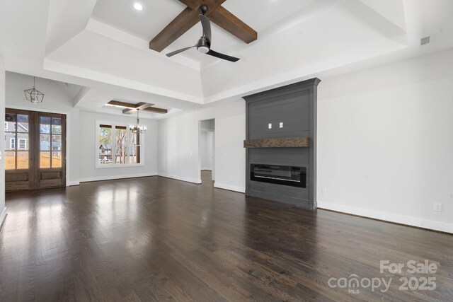 3732 Whitney Dr NE, Hickory, NC 28601 - unfurnished living room featuring a raised ceiling, a ceiling fan, a chandelier, a fireplace, and recessed lighting