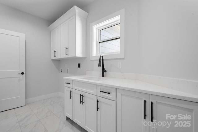 3732 Whitney Dr NE, Hickory, NC 28601 - washroom featuring light marble finish floors, cabinet space, and hookup for a washing machine