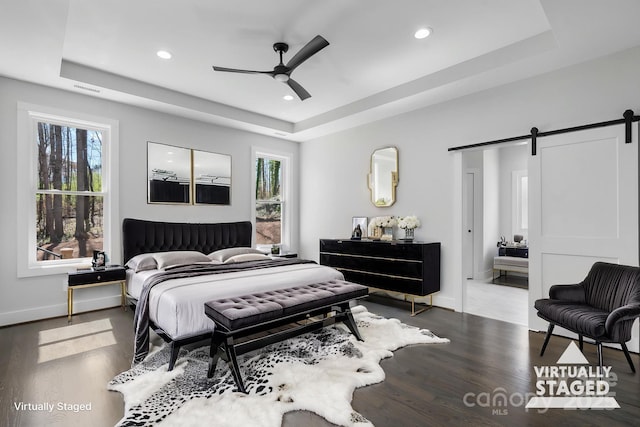 3732 Whitney Dr NE, Hickory, NC 28601 - bedroom with a raised ceiling, a barn door, wood finished floors, recessed lighting, and ceiling fan