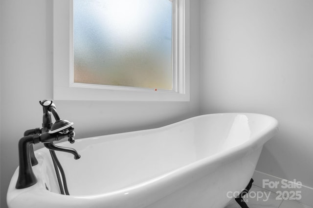 3732 Whitney Dr NE, Hickory, NC 28601 - bathroom with a soaking tub and tile patterned flooring
