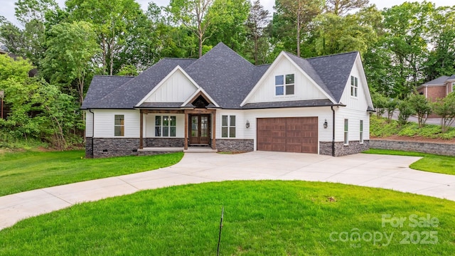 3732 Whitney Dr NE, Hickory, NC 28601 - modern farmhouse with concrete driveway, board and batten siding, a front lawn, and stone siding
