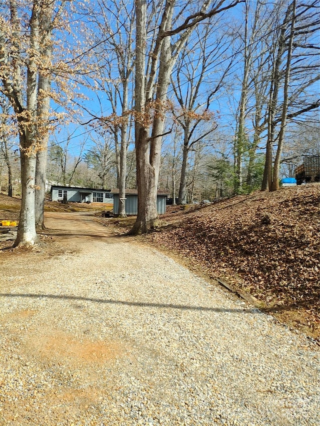 exterior space featuring gravel driveway