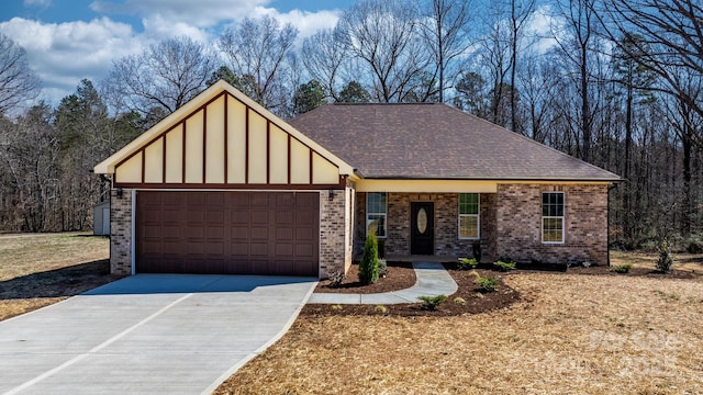 view of front of home featuring driveway, board and batten siding, a shingled roof, a garage, and brick siding