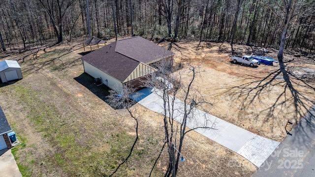 drone / aerial view with a forest view