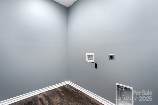 laundry area with baseboards, dark wood finished floors, washer hookup, laundry area, and hookup for an electric dryer