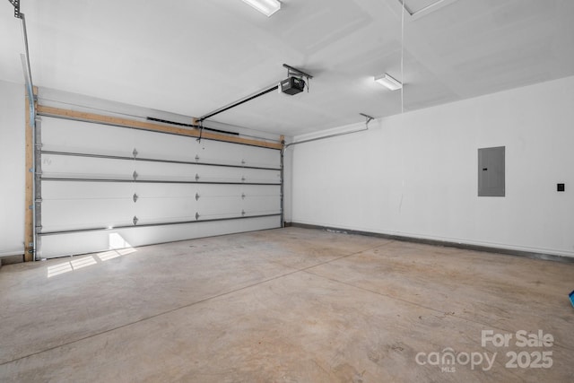 garage with electric panel and a garage door opener