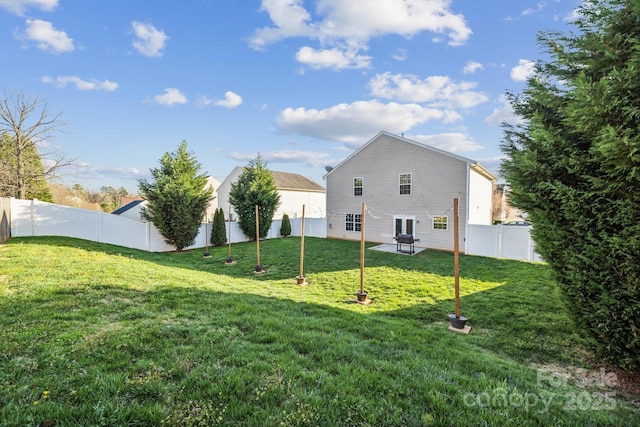 exterior space featuring a fenced backyard