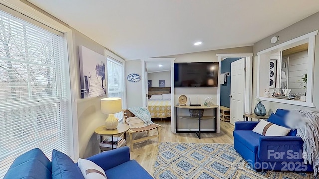 living area featuring recessed lighting and light wood-style floors