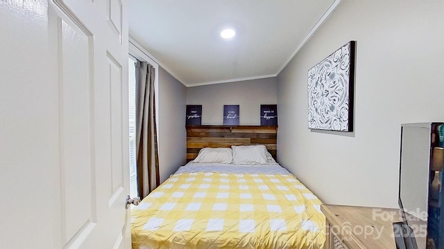 bedroom with ornamental molding