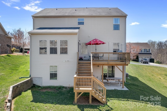 back of property featuring stairs, a patio area, a lawn, and a wooden deck