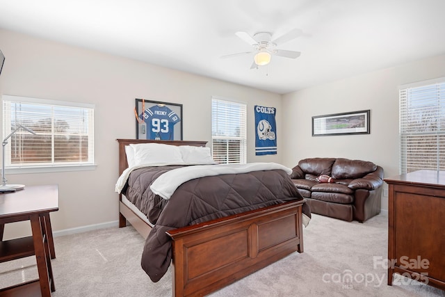 bedroom featuring carpet flooring, a ceiling fan, and baseboards