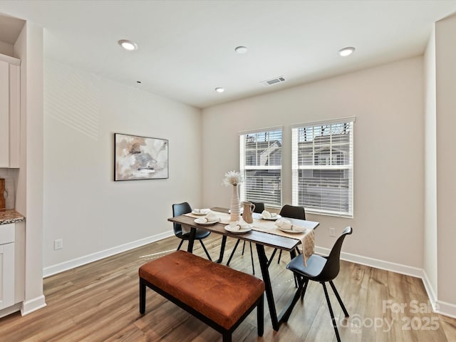 dining area with recessed lighting, visible vents, baseboards, and light wood-style floors