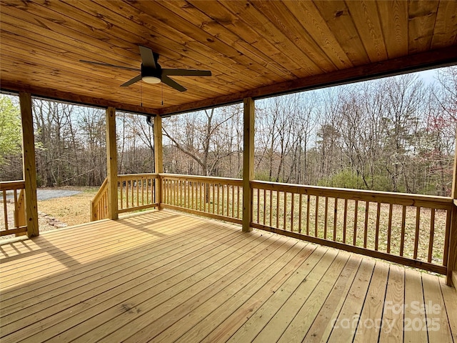 wooden deck with ceiling fan