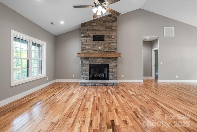 82 Arrowood Rd, Weaverville, NC 28787 - unfurnished living room with a ceiling fan, light wood finished floors, high vaulted ceiling, baseboards, and a fireplace