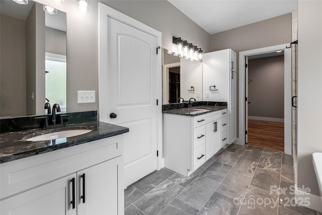 82 Arrowood Rd, Weaverville, NC 28787 - full bath with two vanities and marble look tiles
