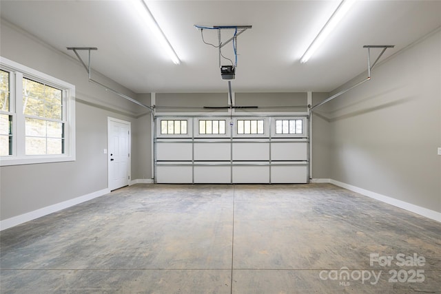 82 Arrowood Rd, Weaverville, NC 28787 - garage with a garage door opener and baseboards