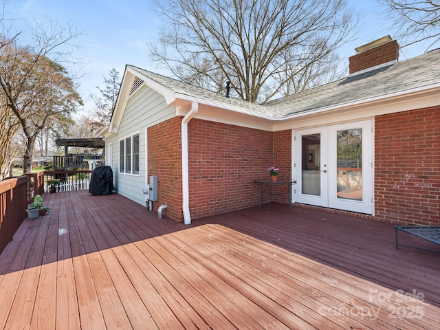 wooden deck with french doors