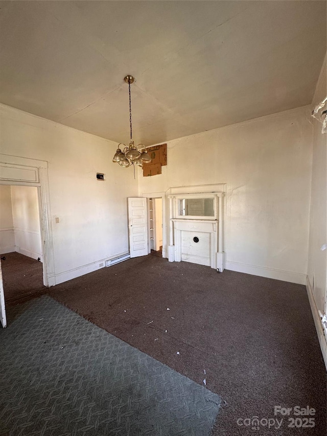 empty room featuring baseboards, carpet floors, and a chandelier