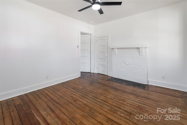 unfurnished living room featuring dark wood finished floors, a fireplace with flush hearth, a ceiling fan, and baseboards