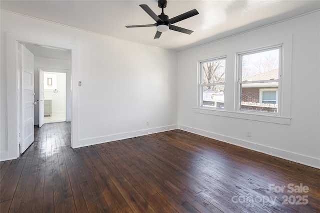 empty room featuring dark wood-style floors, ceiling fan, and baseboards