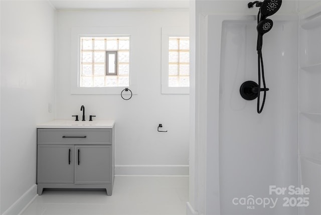 bathroom featuring vanity and walk in shower