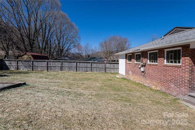 view of yard with fence