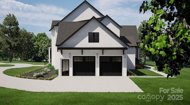 view of front of property with stucco siding, a garage, and a front lawn