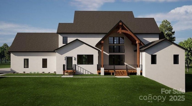 view of front of property with stucco siding and a front yard